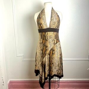 Asymmetrical animal print halter dress.